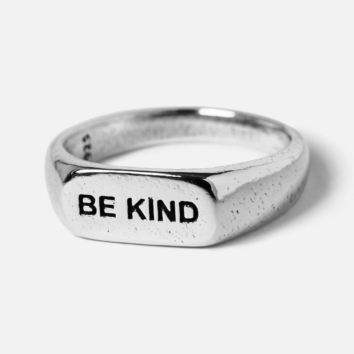 Billie Jo's sterling silver BE KIND ring, a men's signet ring with a modern, masculine design and engraved message. Australian designed jewellery.