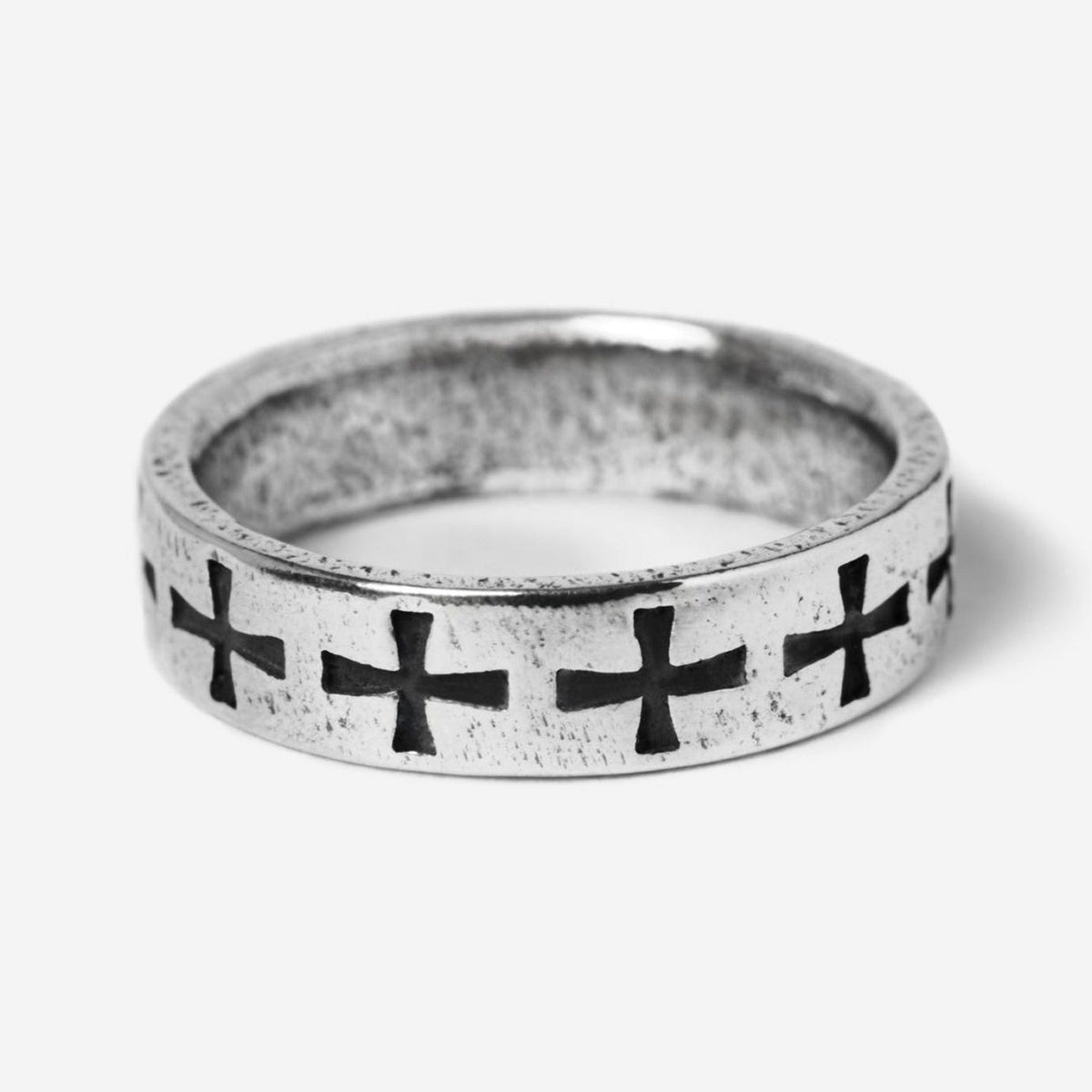 Billie Jo's Sanctum Ring in oxidised sterling silver, with a continuous band of carved cross motifs. Modern men's jewellery from Australia's Gold Coast.