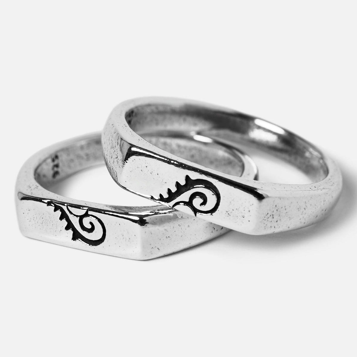 The Connection Stackers, a set of two sterling silver rings by Billie Jo, shown together to highlight their interlocking design.
