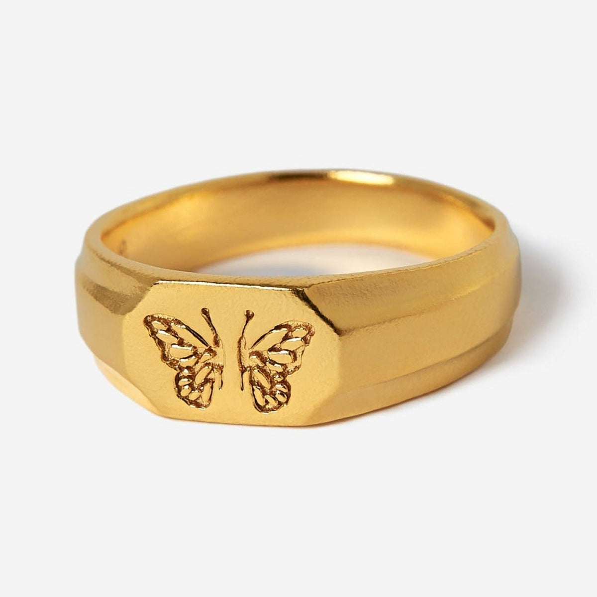 Billie Jo's 18k gold vermeil Revival Ring, a bold men's signet ring with a striking butterfly design, shot on a clean white background. A modern piece of Australian men's jewellery.