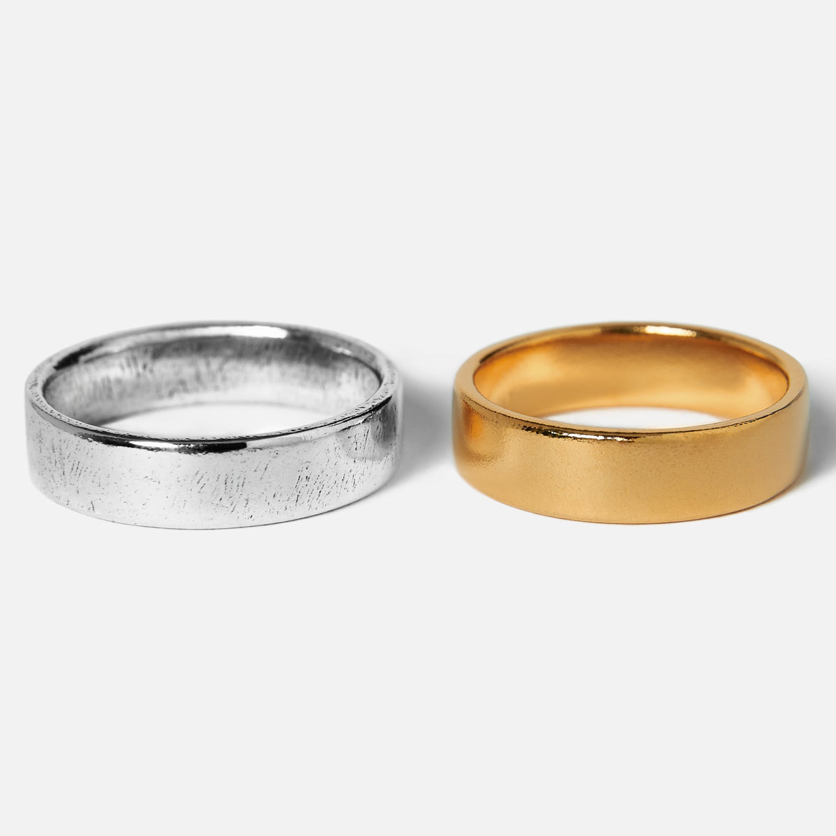 Billie Jo's Serenity Silver & Gold ring set, showcasing the textured sterling silver and the smooth 18k gold vermeil bands side-by-side on a white background.