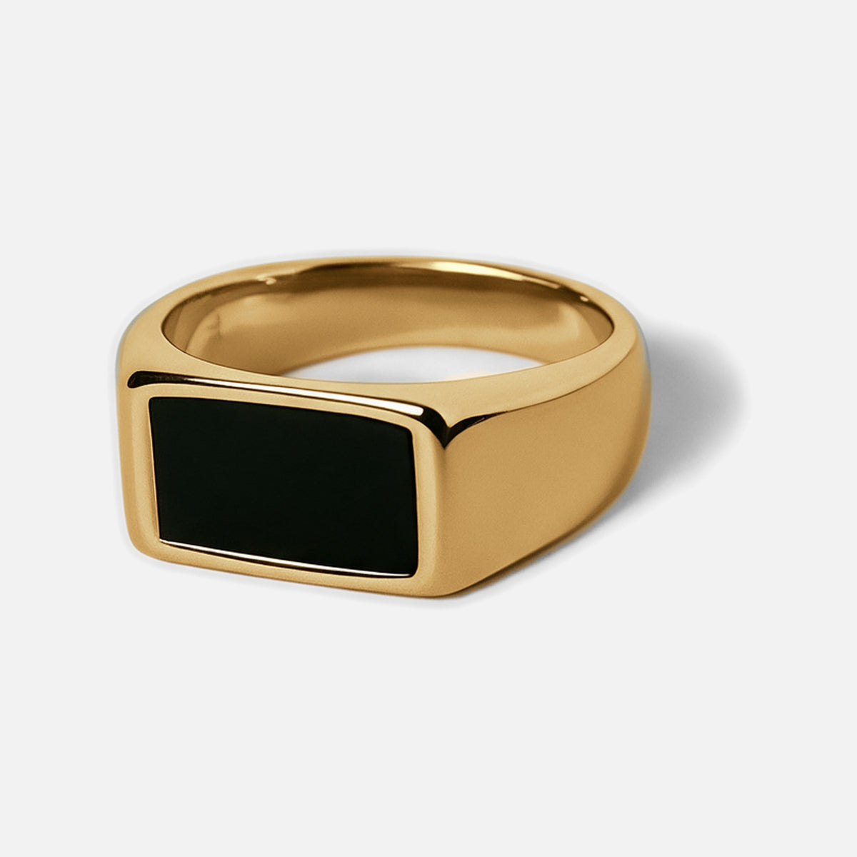 Men's Gold Onyx Ring in 18k gold infused stainless steel, angled front view showing the black onyx stone
