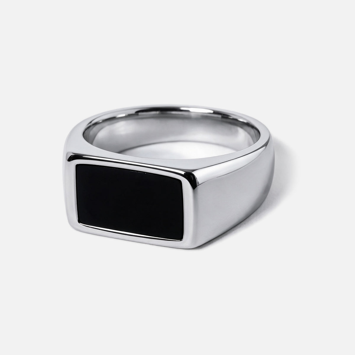 Men's Onyx Ring in 316L stainless steel, silver finish, angled front view showing the black onyx stone on a white background