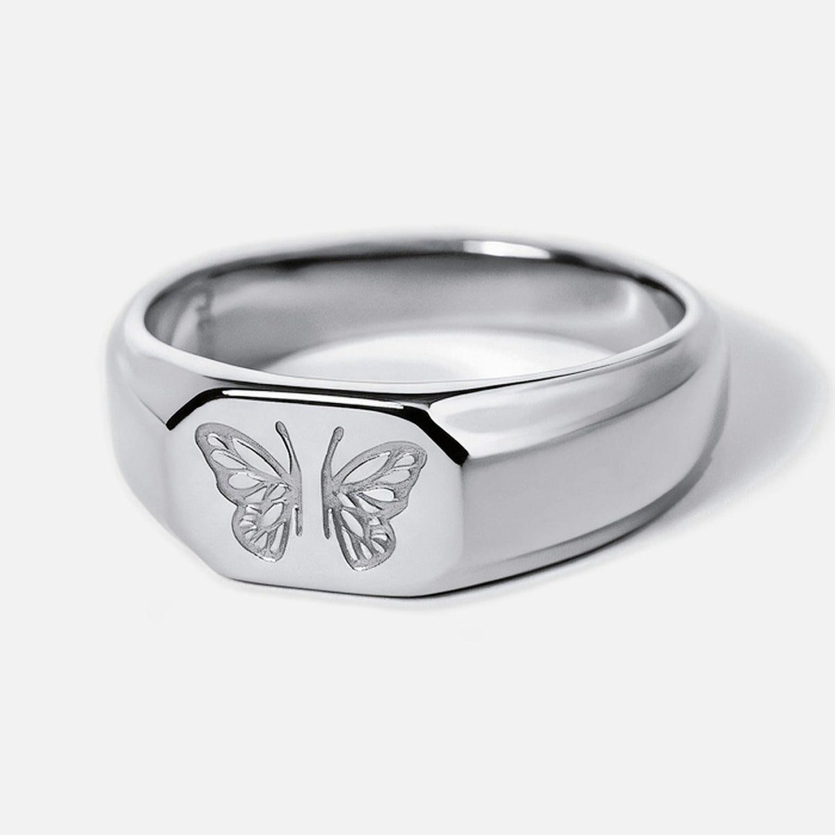 Men's Revival Ring in 316L stainless steel, silver finish, front angle showing the engraved butterfly, white background