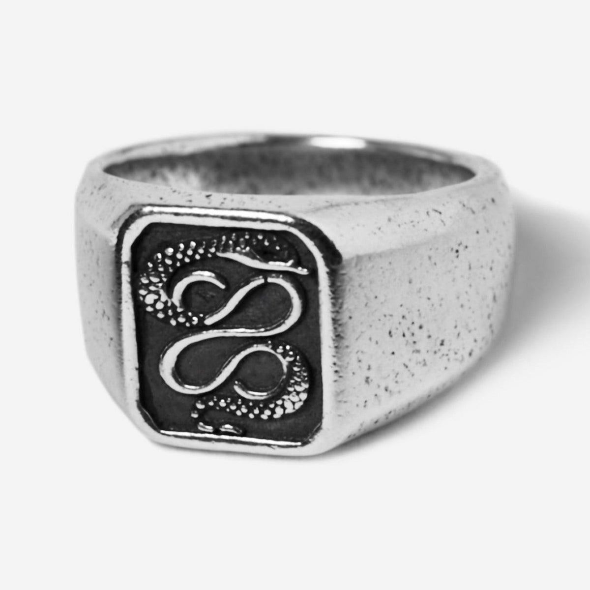 The Billie Jo Serpent Ring in 925 sterling silver. This men's signet ring showcases a detailed, coiled serpent on a textured black face.