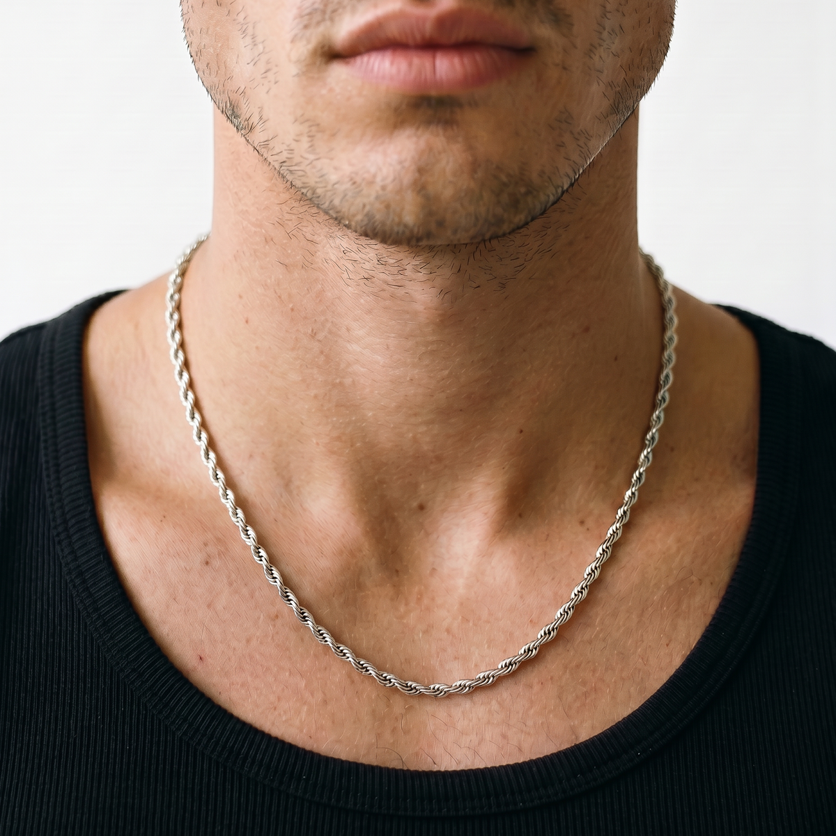 A silver stainless steel rope chain necklace from Australian jewellery brand Billie Jo, worn by a male model, a waterproof sweat proof everyday necklace and the perfect gift for him.