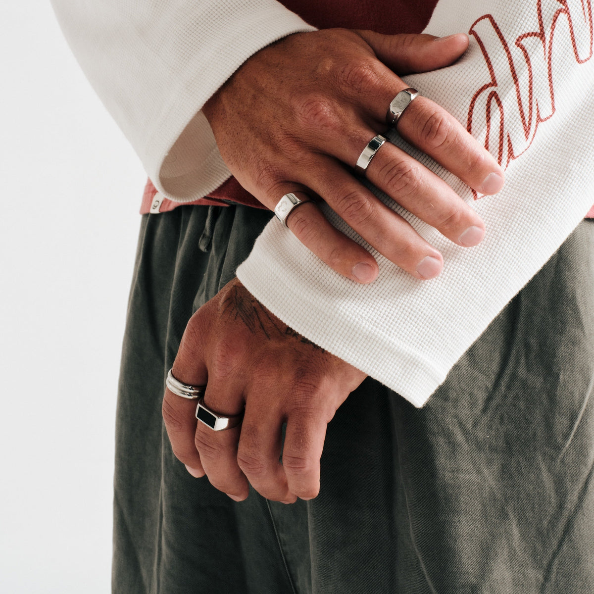 Men's Stacker Rings in 316L stainless steel, silver finish, both worn on his left index finger