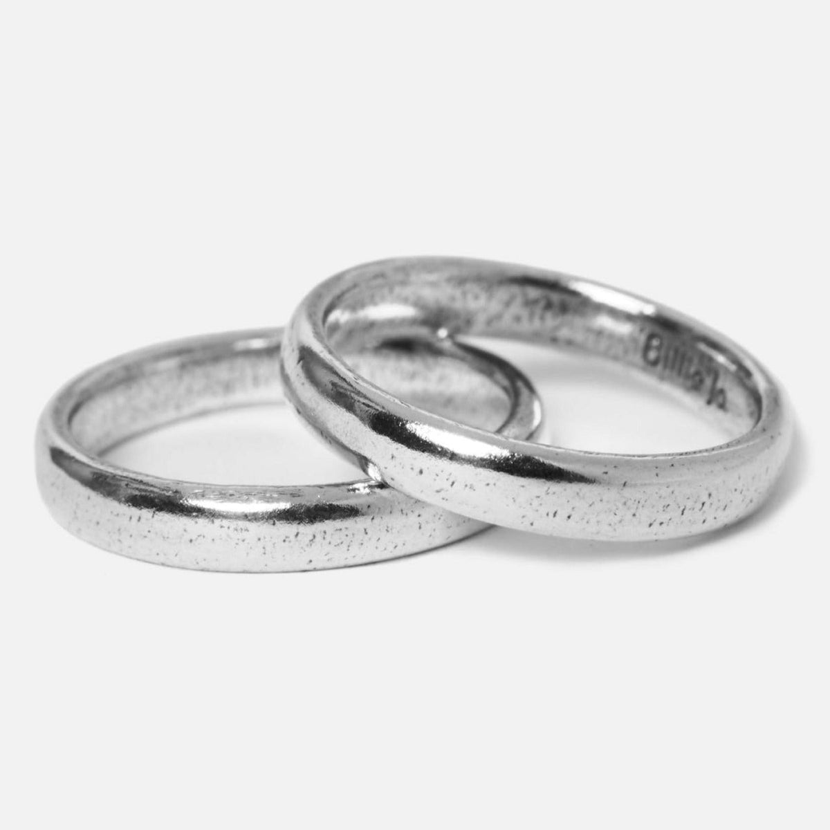 A pair of Billie Jo Stacker Rings in sterling silver, featuring a minimalist and modern design with a rustic textured finish, perfect for stacking.