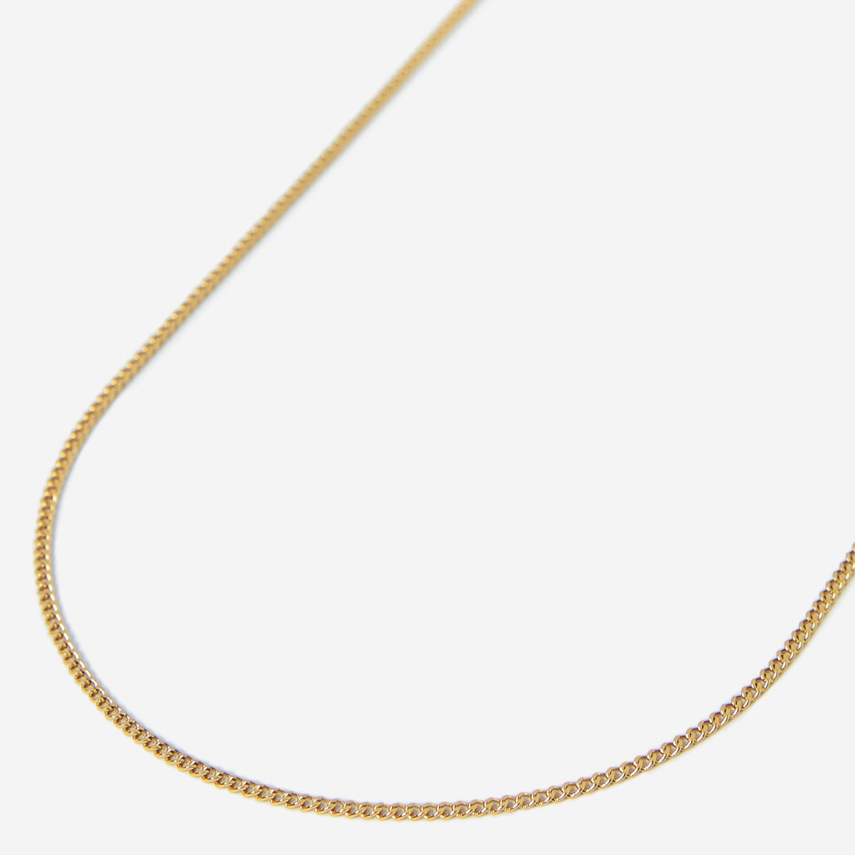 A gold stainless steel men's slim curb chain necklace from Australian jewellery brand Billie Jo, the perfect waterproof and sweat proof everyday bracelet and an ideal gift for men who love low maintenance jewellery