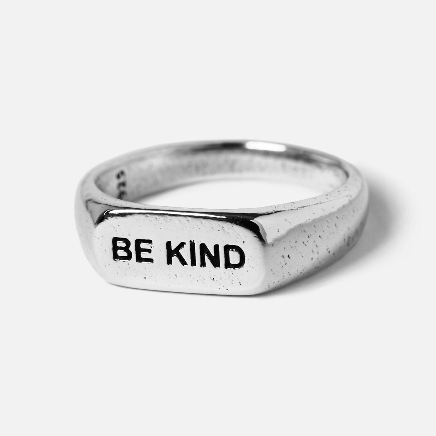Billie Jo's sterling silver BE KIND ring, a men's signet ring with a modern, masculine design and engraved message. Australian designed jewellery.