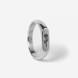 A side view of the sterling silver Rosa II ring by Billie Jo, showing the detailed rose engraving and the textured finish of this unique piece of men's jewellery.