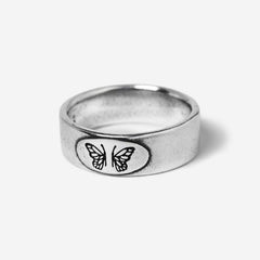 Billie Jo's Elaris Ring in sterling silver, featuring a detailed butterfly engraving. A modern, masculine piece of Australian men's jewellery.