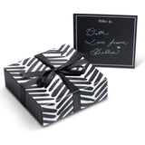 Complete your men's jewellery gift with the signature Billie Jo gift wrap service. Features a stylish black and white patterned box, black ribbon, and a personalised note card.