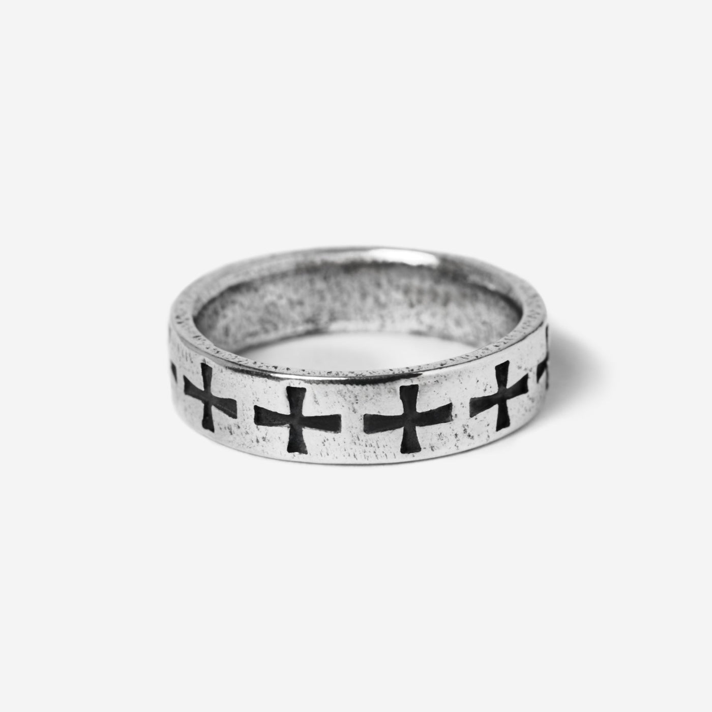 Billie Jo's Sanctum Ring in oxidised sterling silver, with a continuous band of carved cross motifs. Modern men's jewellery from Australia's Gold Coast.