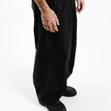 A full-length shot of a model wearing the Billie Jo Slim Rope Bracelet, showcasing how this versatile silver jewellery piece complements a modern, casual outfit.