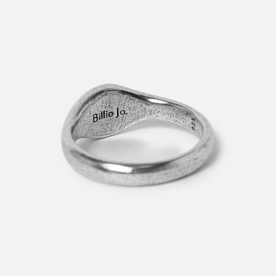 A close-up of the inside of the Billie Jo ONYX 2.0 RING, showing the engraved brand name and 925 sterling silver stamp. A detail shot of the men's jewellery piece.