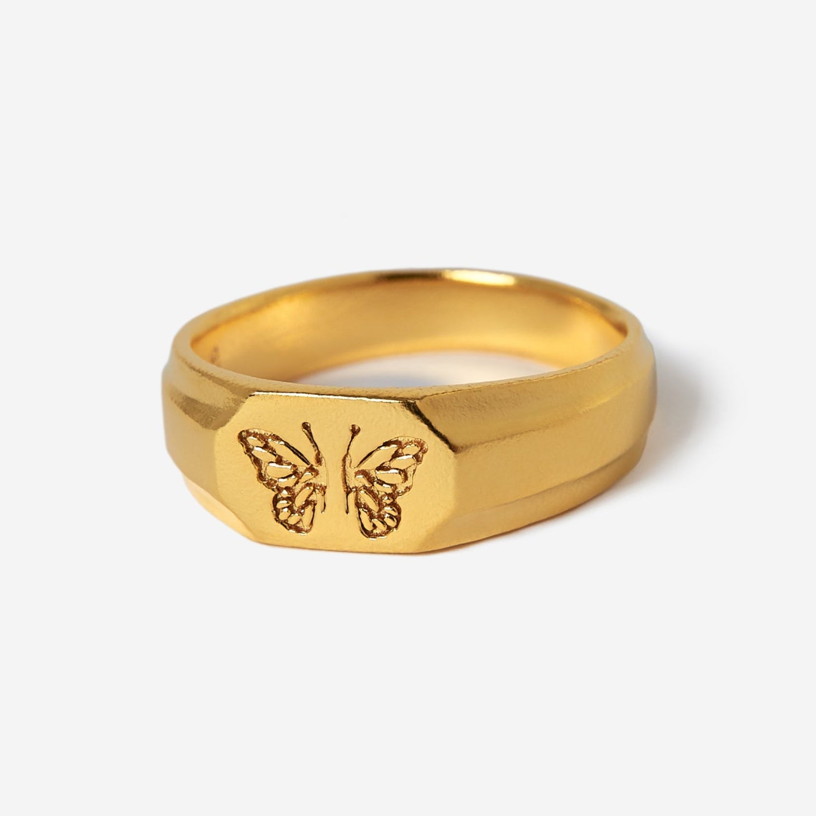 Billie Jo's 18k gold vermeil Revival Ring, a bold men's signet ring with a striking butterfly design, shot on a clean white background. A modern piece of Australian men's jewellery.