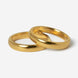 Two gold stacker rings from Billie Jo Jewellery, with a smooth, polished finish, are shown overlapping on a clean white background. The 18k gold vermeil has a warm, rich colour.