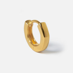 A single 18k gold vermeil Lumina Earring from Billie Jo, standing upright to showcase its unique shape and minimalist design on a white background.