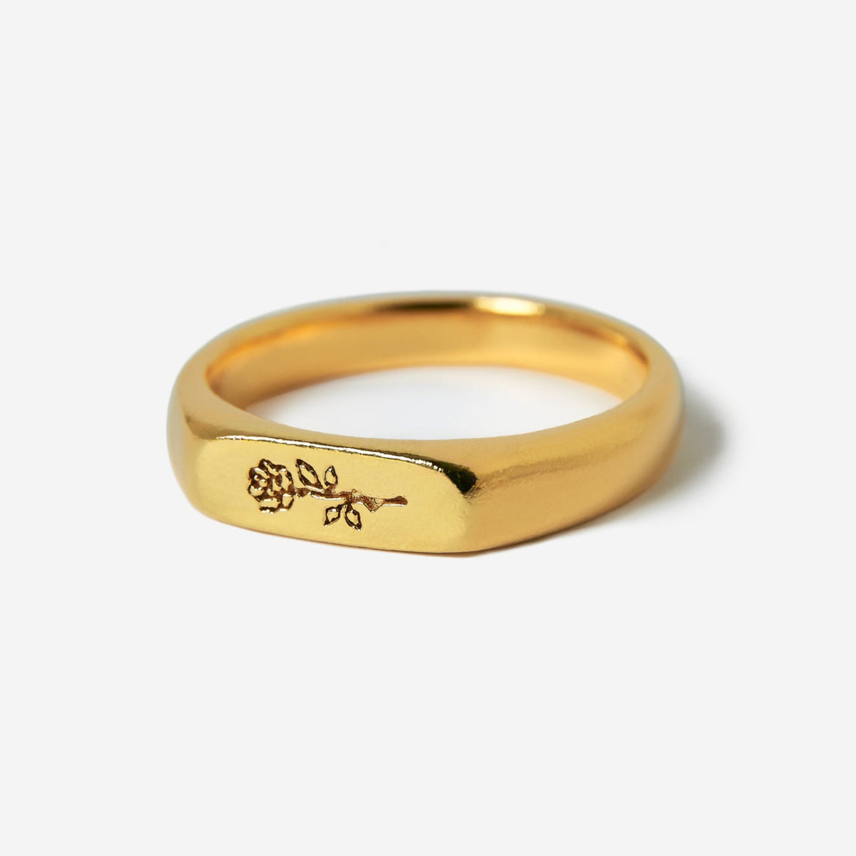 A detailed studio shot of the Billie Jo Rosa II Ring in 18k gold vermeil, featuring a delicate rose engraving on its flat signet-style face.