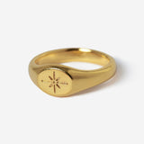 The Billie Jo Luminous Ring in 18k gold vermeil, a men's signet ring with a detailed starburst engraving, shown on a clean white background. Australian men's jewellery.