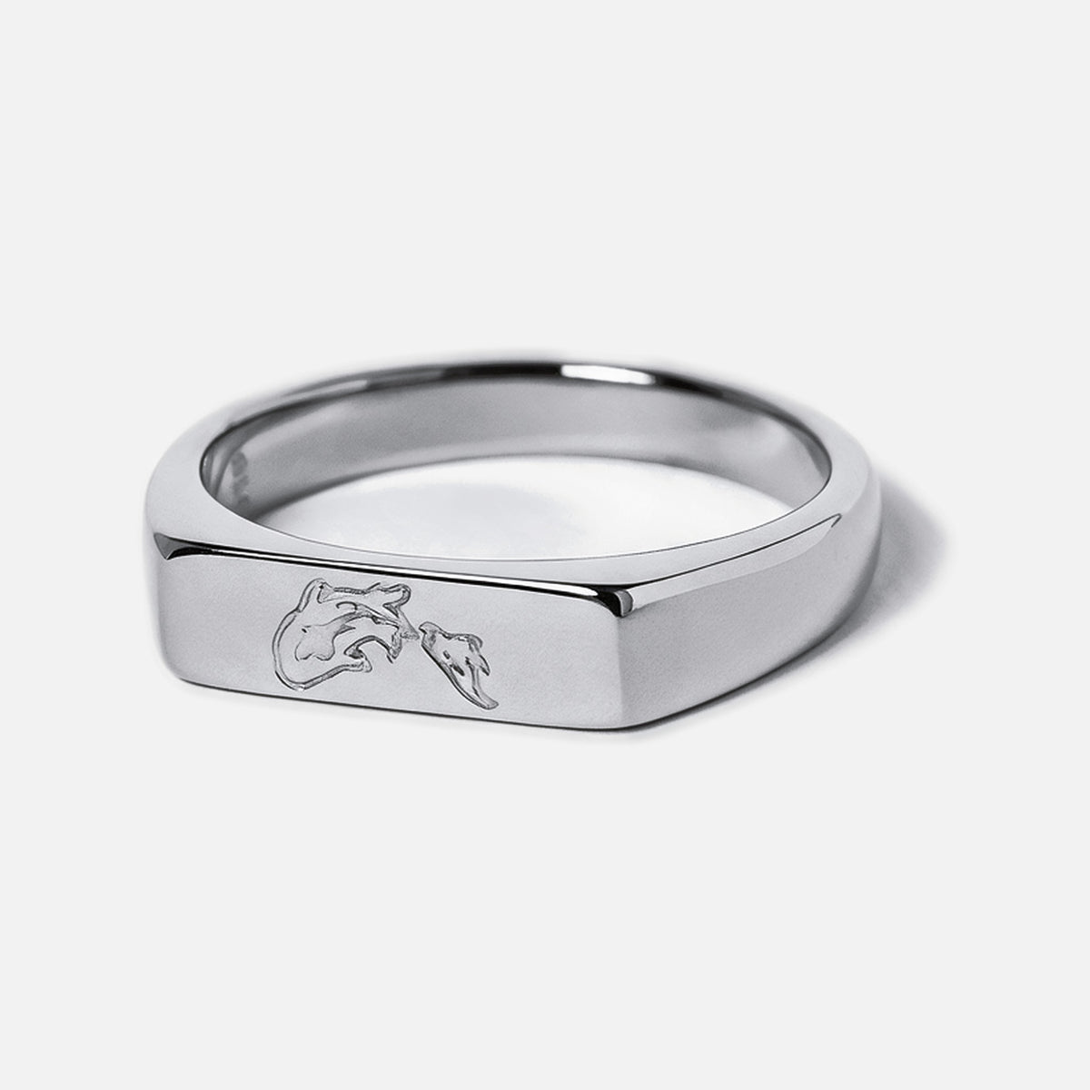 Men's Koi II Ring in 316L stainless steel, silver finish, angled front view showing the koi outline engraved on the bar face