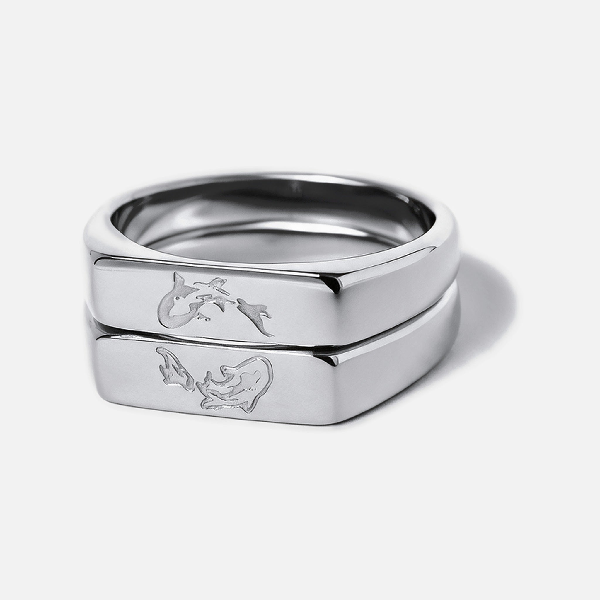 Men's Koi Stackers in 316L stainless steel, silver finish, pair stacked, koi engraved on each face