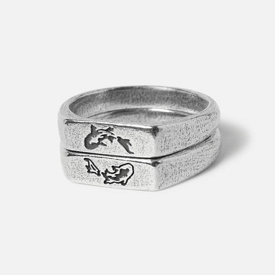 Billie Jo's Koi Stackers, a set of two sterling silver rings. One ring features an engraved koi fish design, the other a simple textured band. Modern men's jewellery from the Gold Coast.
