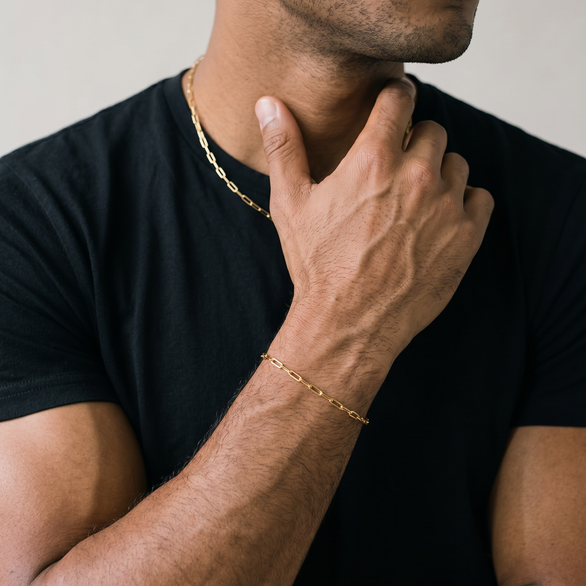 Stainless Steel Gold Bracelet on male black tee shirt