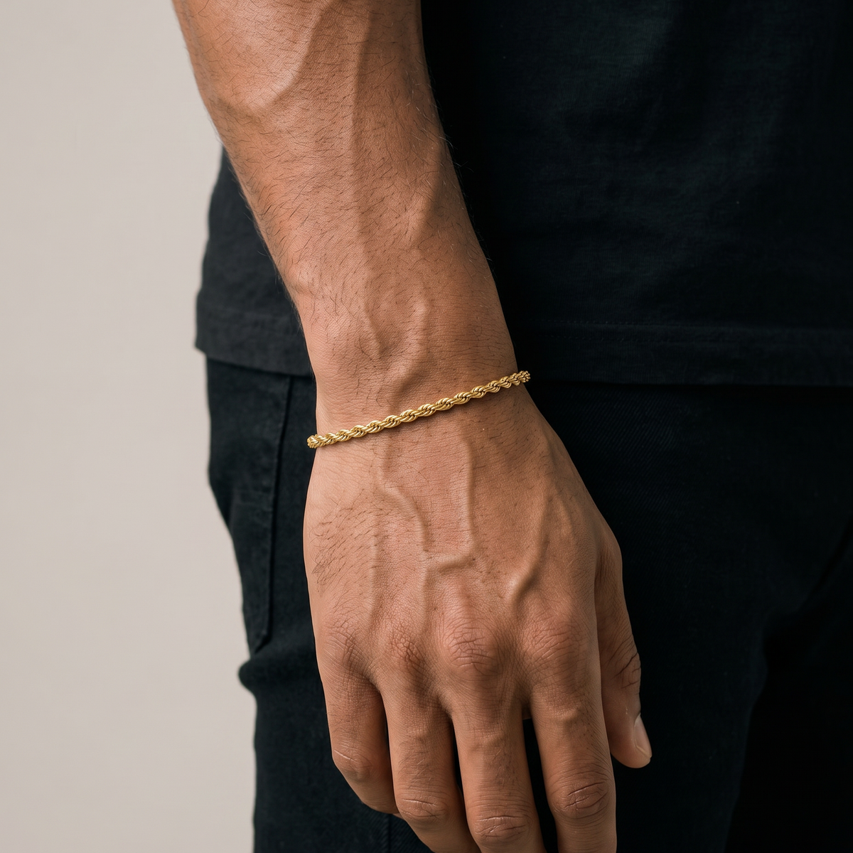 A stainless steel men's gold rope chain bracelet from Australian jewellery brand Billie Jo, featuring a twisted link design in a gold tone finish.