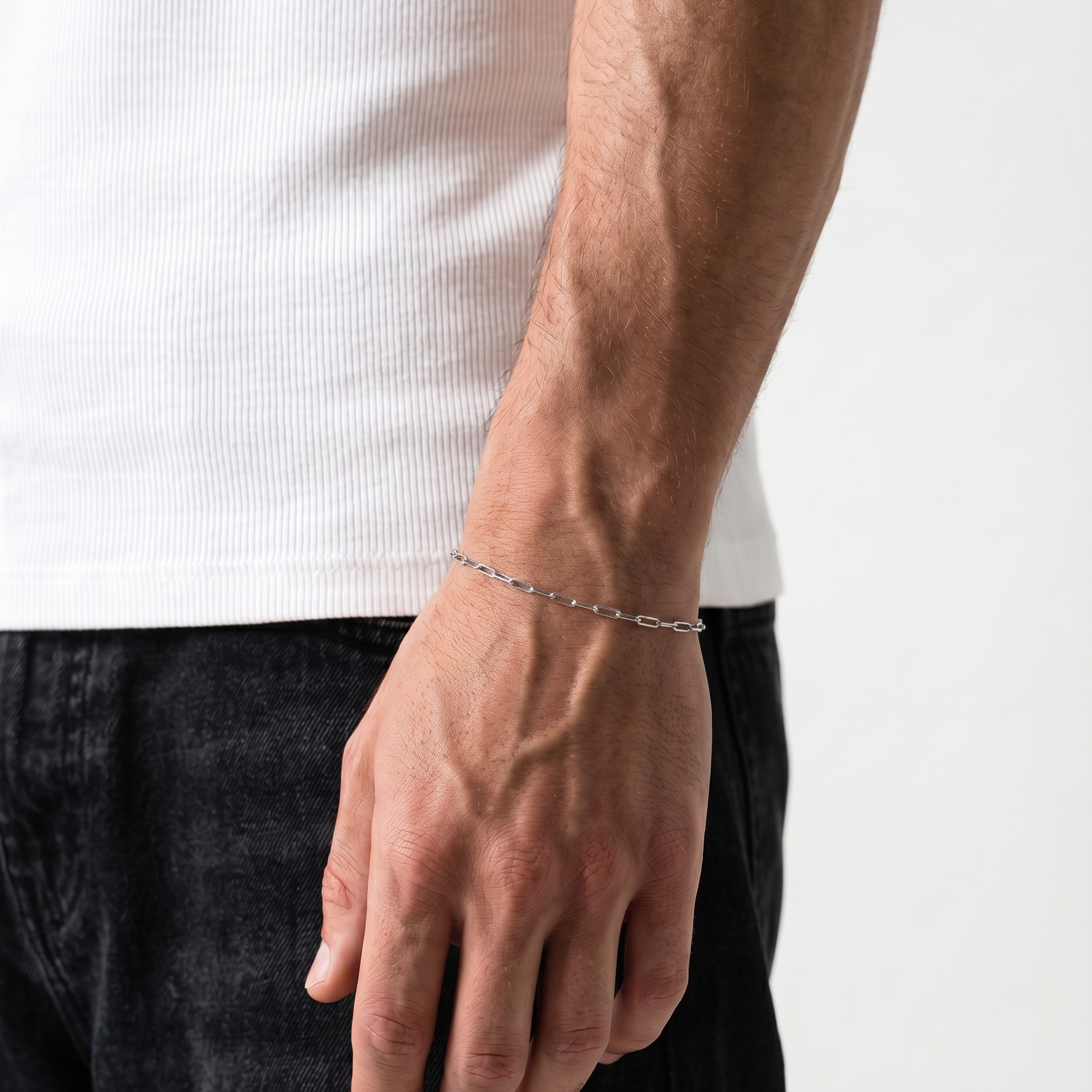 Stainless Steel Silver Link Bracelet on Male wrist - waterproof, sweat proof, perfect for everyday wear