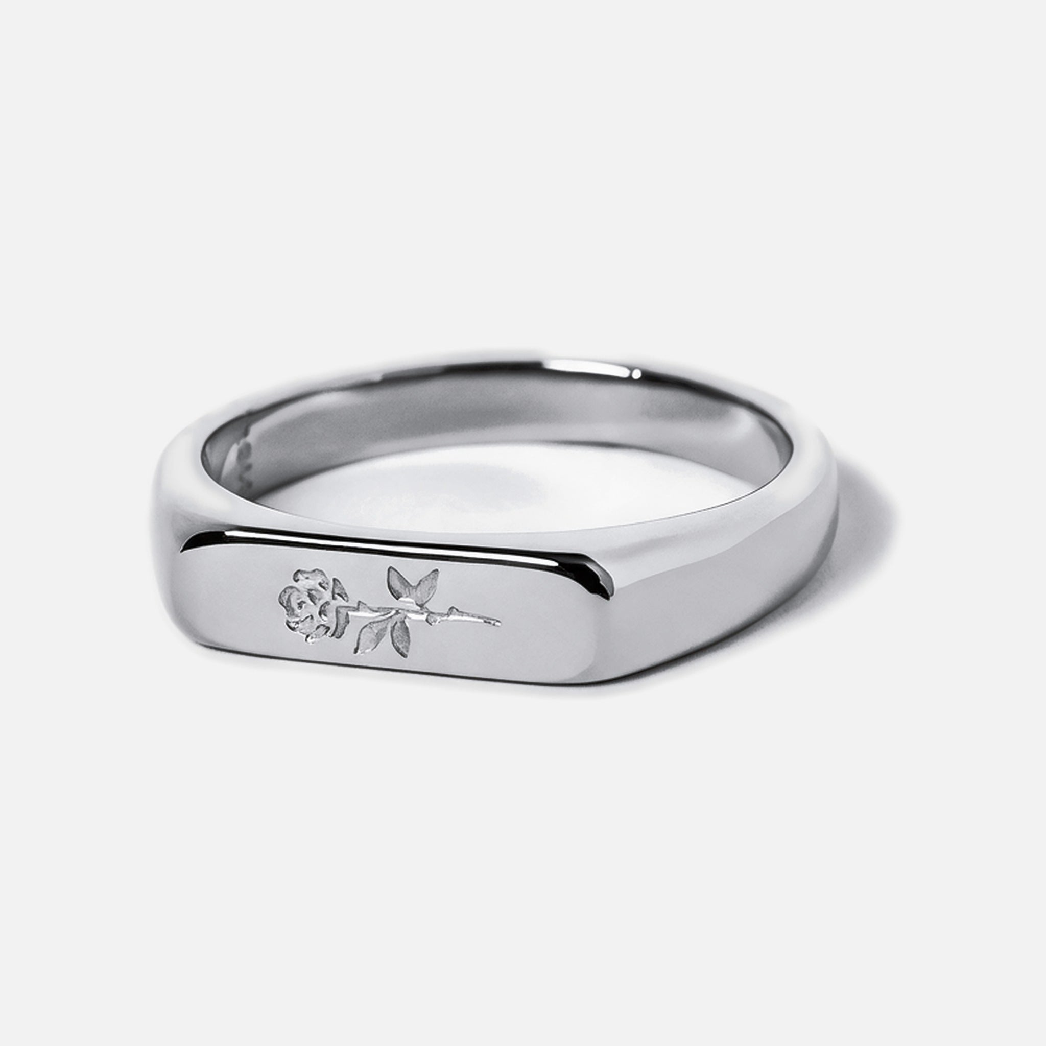 Men's Rosa I Ring in 316L stainless steel, silver finish, single bar ring, rose engraved on the face, white background