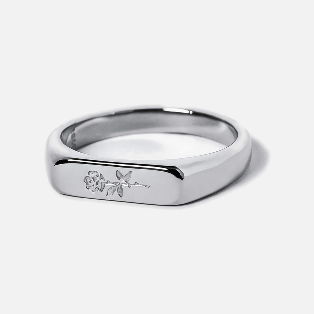 Men's Rosa I Ring in 316L stainless steel, silver finish, single bar ring, rose engraved on the face, white background