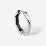 A single sterling silver Carve Earring from Billie Jo, shown standing to highlight its unique, hand-carved texture and modern, geometric shape. Men's jewellery.