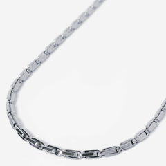 Silver chain necklace on a white background