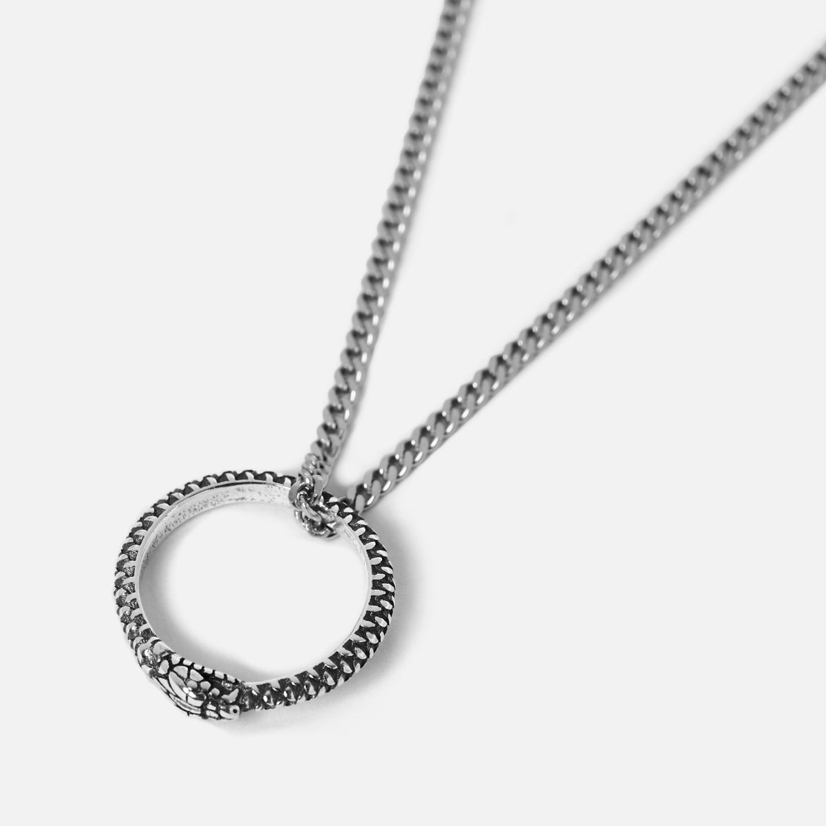 Billie Jo's Ouroboros Pendant in 925 sterling silver, featuring a detailed snake eating its own tail, on a classic curb chain. Modern men's jewellery.