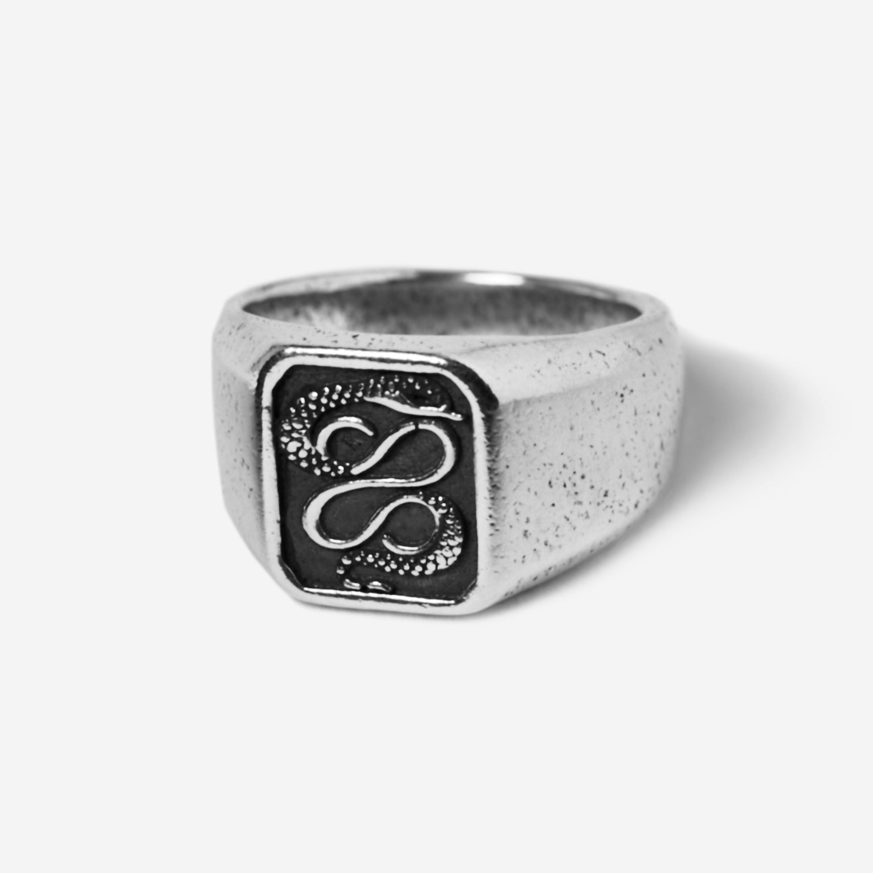 The Billie Jo Serpent Ring in 925 sterling silver. This men's signet ring showcases a detailed, coiled serpent on a textured black face.