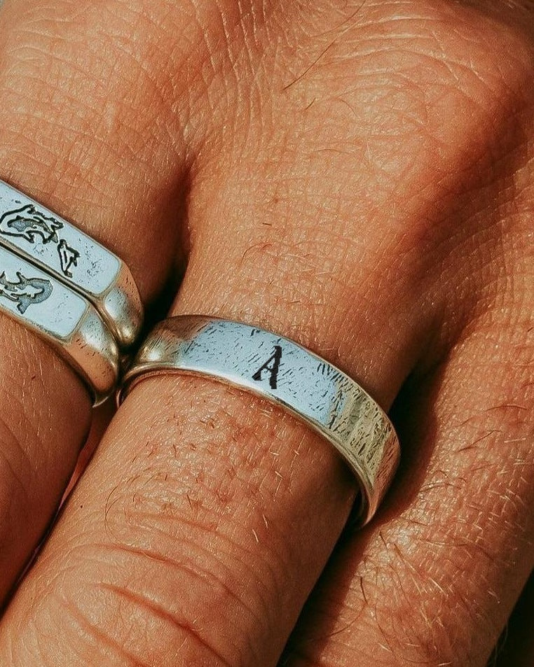 Initial Serenity Ring with the letter A, worn on a man's hand
