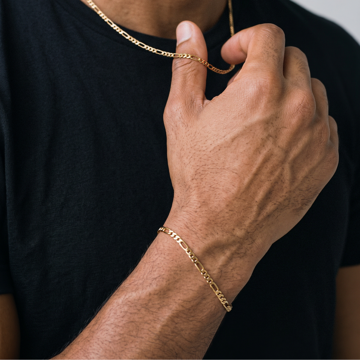A close up of a stainless steel men's gold chain bracelet from Australian jewellery brand Billie Jo, worn against skin showing waterproof everyday style.