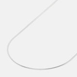 A sleek, sterling silver Snake Necklace from Billie Jo, featuring a smooth, flexible chain that catches the light. This minimalist men's necklace is perfect for everyday wear.